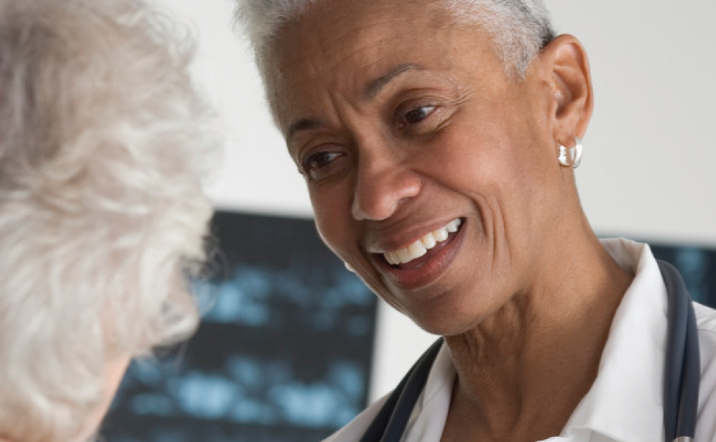 Doctor listening to patient